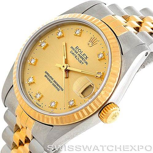 This image shows a close-up, angled view of a Rolex Mid-Size 68273 Women's Stainless Steel Champagne Dial 68273 Women's Stainless Steel Champagne Dial Datejust watch, highlighting its dial, bezel, and portion of the bracelet.