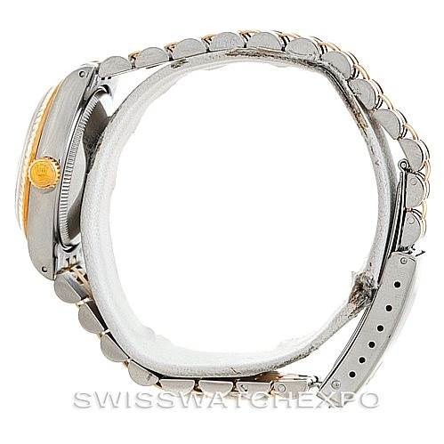 This image shows a side profile of a Rolex Mid-Size 68273 Women's Stainless Steel Champagne Dial 68273 Women's Stainless Steel Champagne Dial watch, highlighting the case, crown, and bracelet.