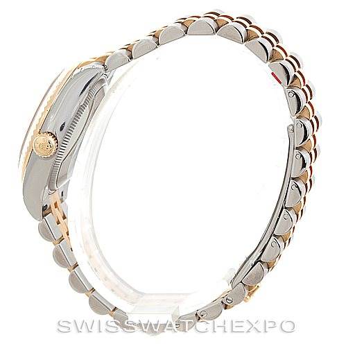 This side view of the Rolex Mid-Size 178273 Women's Steel and Gold (two tone) White Dial 178273 Women's Steel and Gold (two tone) White Dial model shows the crown, case, and bracelet.