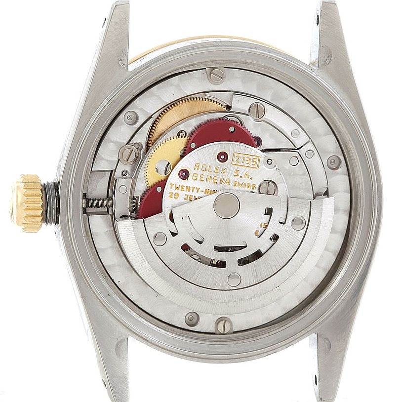 The image shows the internal movement parts of a Rolex Mid-Size 68273 Women's Stainless Steel Champagne Dial 68273 Women's Stainless Steel Champagne Dial watch from a back view angle.