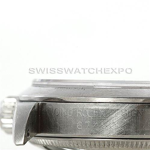 This image shows the side profile of a Mid-Size Rolex watch, displaying the crown and the engraved model number.