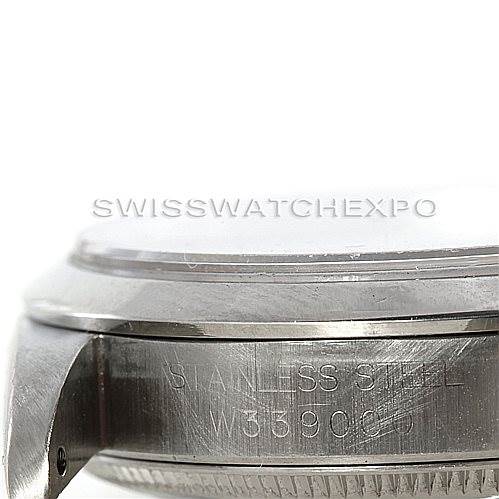 This image shows a side view of the casing and lugs of a Rolex Mid-Size 67480 Women's Stainless Steel Blue Dial 67480 Women's Stainless Steel Blue Dial watch, highlighting the "STAINLESS STEEL" and model number engraving.