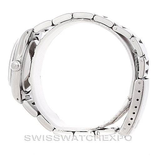 The image shows a side view of the Rolex Mid-Size 67480 Women's Stainless Steel Silver Dial 67480 Women's Stainless Steel Silver Dial model, highlighting the bracelet and clasp.