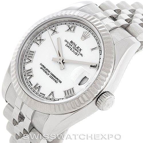 The image shows a Rolex Mid-Size 178274 Women's Stainless Steel White Dial 178274 Women's Stainless Steel White Dial Datejust watch at a tilted angle, highlighting the face, bezel, crown, and part of the bracelet.