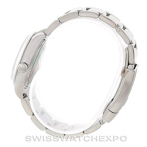 The image shows a side profile angle of the Rolex Mid-Size 178240 Women's Stainless Steel White Dial 178240 Women's Stainless Steel White Dial model watch, highlighting the side of the case and the bracelet links.