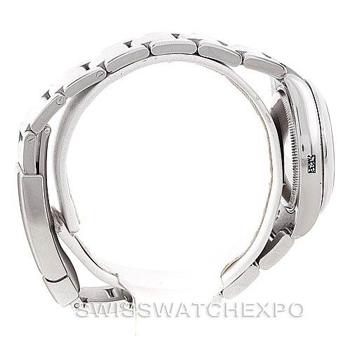 This image of the Rolex Mid-Size 177200 Women's Stainless Steel Black Dial 177200 Women's Stainless Steel Black Dial model watch shows a side view of the bracelet, bezel, and case.