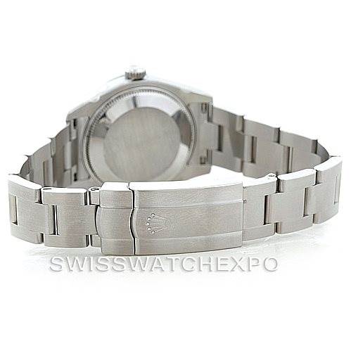 The image shows the back and clasp of a Rolex Mid-Size 177200 Women's Stainless Steel Black Dial 177200 Women's Stainless Steel Black Dial model watch, highlighting its metal bracelet and caseback.