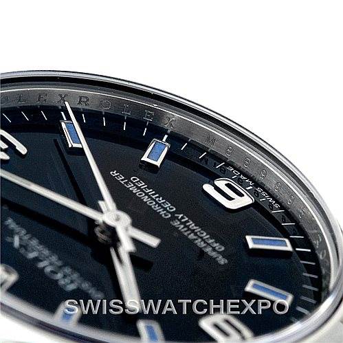 This image shows a close-up, angled view of the dial and bezel of a Rolex Mid-Size 177200 Women's Stainless Steel Black Dial 177200 Women's Stainless Steel Black Dial watch.