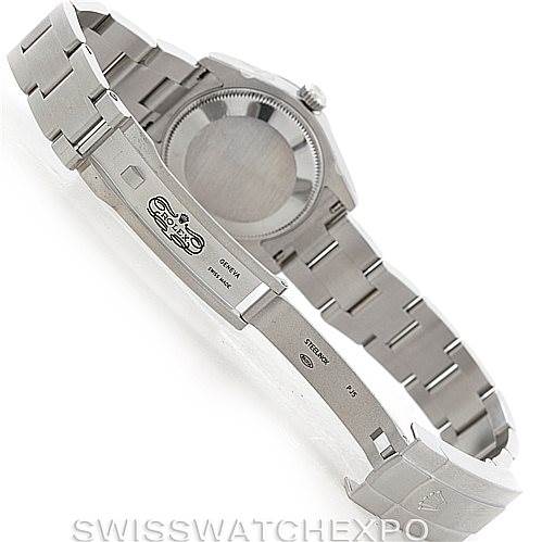 This image shows the back case, bracelet, and clasp of a Mid-Size Rolex watch, with the clasp open and the underside of the bracelet visible.