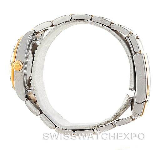 This image shows a side view of a Rolex Mid-Size 178313 Women's Stainless Steel Champagne Dial 178313 Women's Stainless Steel Champagne Dial model watch, highlighting its bracelet, crown, and case.