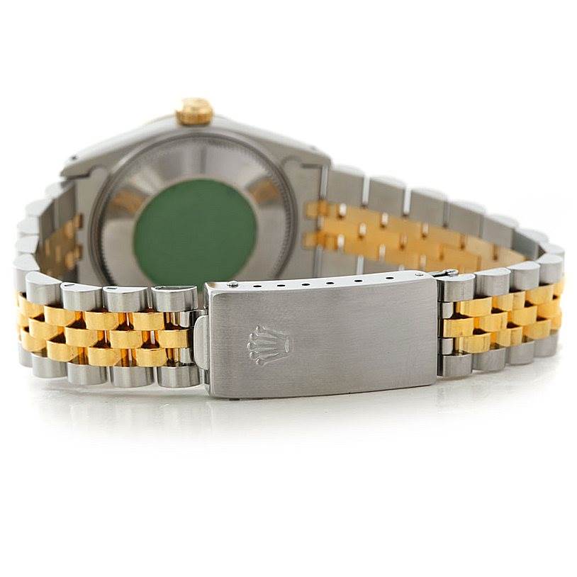 The image shows the back and clasp of a Mid-Size Rolex watch, highlighting its two-tone bracelet.