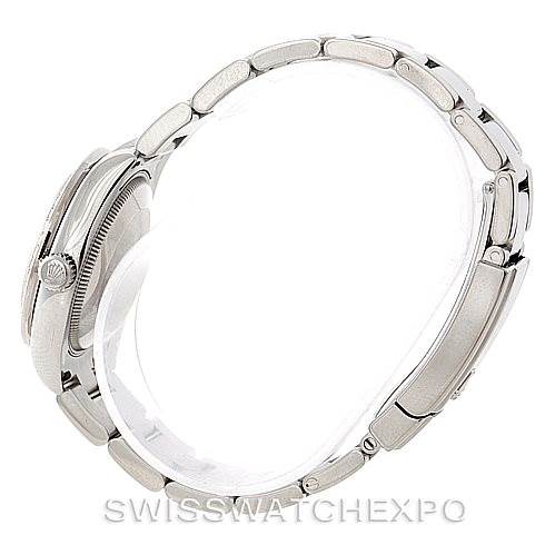 This image shows a side profile of the Rolex Mid-Size 178384 Women's Stainless Steel Grey Dial 178384 Women's Stainless Steel Grey Dial model, highlighting the watch's case, crown, and bracelet links.