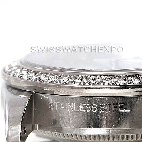 This image shows a close-up angled view of the bezel and case side of a Rolex Mid-Size 178384 Women's Stainless Steel Grey Dial 178384 Women's Stainless Steel Grey Dial model watch, emphasizing the "STAINLESS STEEL" engraving.