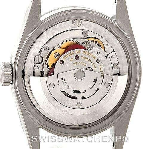 This image shows a back view of the Rolex Mid-Size 78240 Women's Stainless Steel Black Dial 78240 Women's Stainless Steel Black Dial model, focusing on the movement and internal mechanisms.