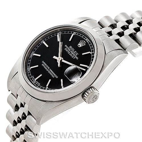 This image shows a side angle of a Rolex Mid-Size 78240 Women's Stainless Steel Black Dial 78240 Women's Stainless Steel Black Dial watch, highlighting the black dial, cyclops lens, crown, and part of the Jubilee bracelet.