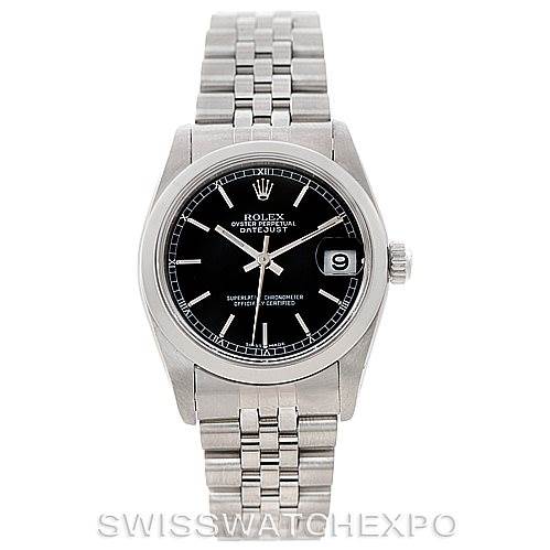 This image shows a Mid-Size Rolex Datejust watch from a front angle, highlighting its black dial, date window, and stainless steel bracelet.
