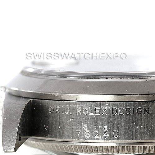 The image shows a close-up of the case edge of a Rolex Mid-Size 78240 Women's Stainless Steel Black Dial 78240 Women's Stainless Steel Black Dial watch, highlighting the engraved model number.