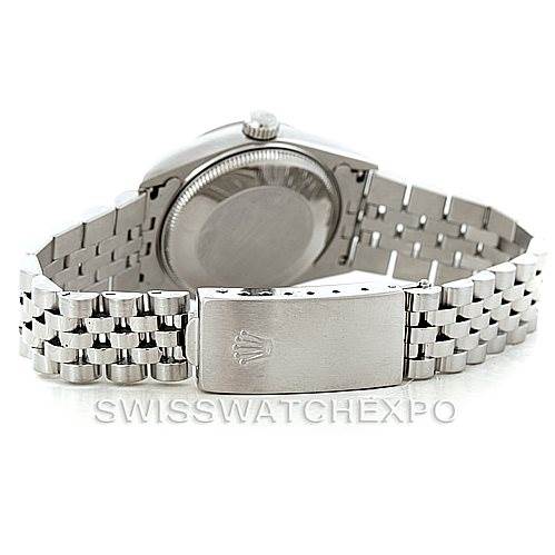 The image shows the back and clasp of a Mid-Size Rolex watch, highlighting the bracelet and caseback.