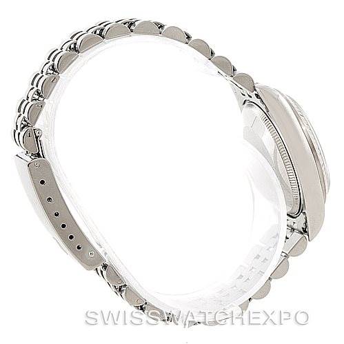 Side view of a Rolex Mid-Size 68274 Women's Stainless Steel Silver Dial 68274 Women's Stainless Steel Silver Dial watch showing the bracelet, clasp, and case.
