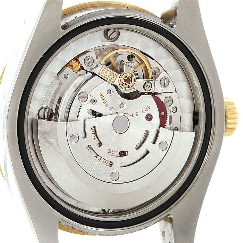 The image shows the inner mechanical movement of a Rolex Mid-Size 178343 Women's Stainless Steel Silver Dial 178343 Women's Stainless Steel Silver Dial watch from the back.