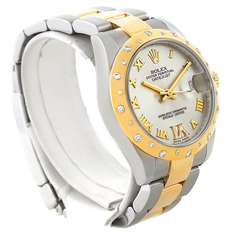 This Rolex Mid-Size 178343 Women's Stainless Steel Silver Dial 178343 Women's Stainless Steel Silver Dial watch is shown from an angled side view, highlighting its two-tone bracelet and diamond-accented bezel.