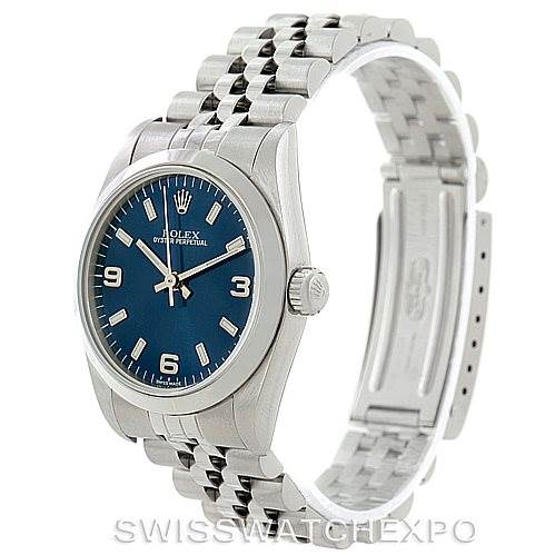 This image shows a Rolex Mid-Size 77080 Women's Stainless Steel Blue Dial 77080 Women's Stainless Steel Blue Dial model watch at a three-quarter angle, highlighting the face, dial, case, and Jubilee bracelet.