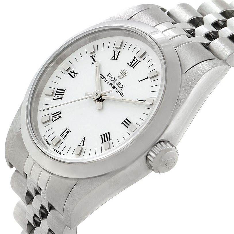 The image shows a Mid-Size Rolex Oyster Perpetual watch from a slight side angle, displaying the face, crown, and bracelet.