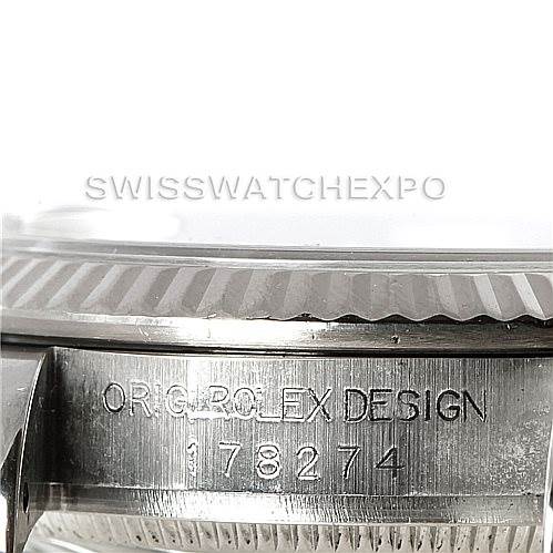 This image shows a close-up of the side of a Rolex Mid-Size 178274 Women's Stainless Steel Silver Dial 178274 Women's Stainless Steel Silver Dial model, revealing the engraved text "ORG ROLEX DESIGN" and the model number 178274.