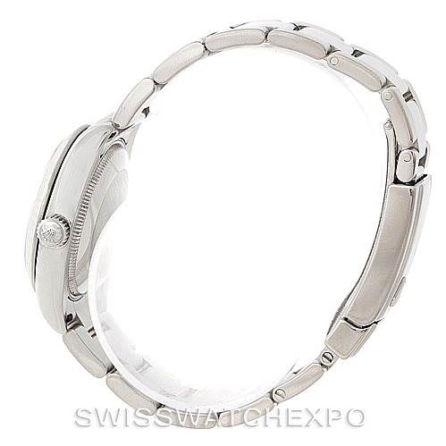 The image shows a side view of a mid-size Rolex watch, highlighting its case, crown, and bracelet.