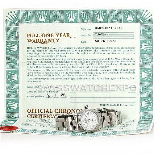 The image shows a Rolex Mid-Size 68240 Women's Stainless Steel White Dial 68240 Women's Stainless Steel White Dial watch with a white Roman dial, placed on its warranty certificate.