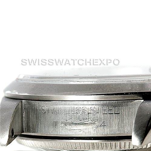 Close-up of the right side of a Rolex Mid-Size 68240 Women's Stainless Steel White Dial 68240 Women's Stainless Steel White Dial model watch case, showing the stainless steel engraving.