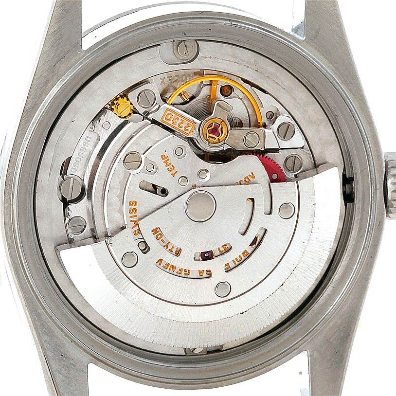 This image shows the internal mechanism of a Rolex Mid-Size 77080 Women's Stainless Steel Blue Dial 77080 Women's Stainless Steel Blue Dial model watch, viewed from the back with its case removed.
