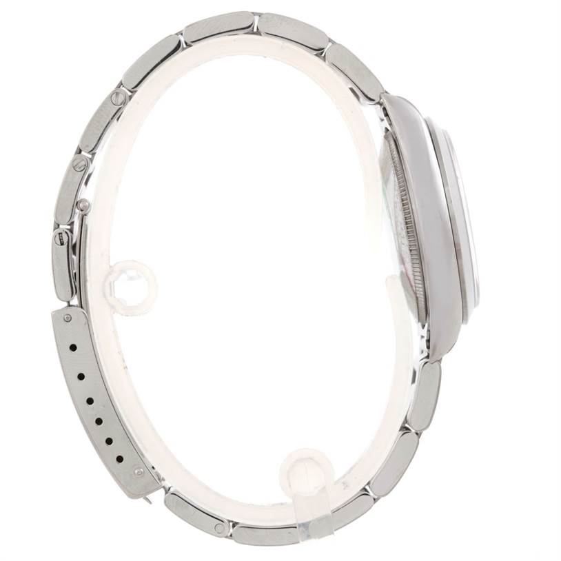 This image shows a side view of a Mid-Size Rolex watch showcasing its case, bracelet, and clasp.