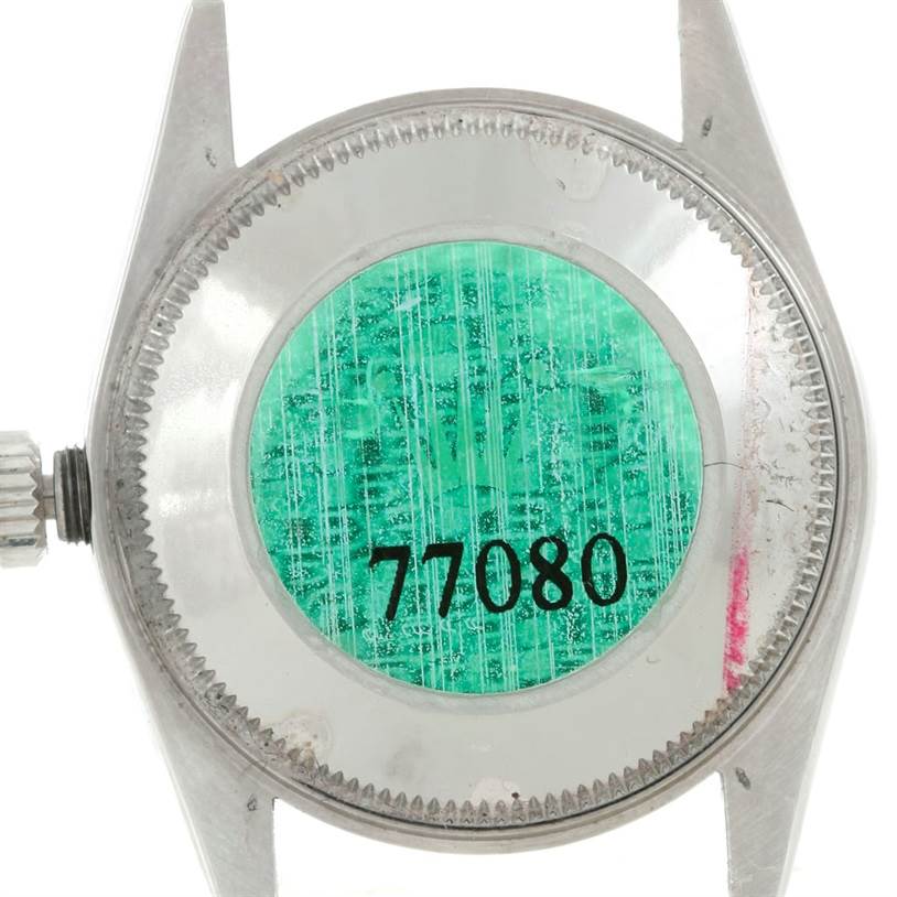 The image shows the back case of a Rolex Mid-Size 77080 Women's Stainless Steel Black Dial 77080 Women's Stainless Steel Black Dial watch, including the serial number 77080.