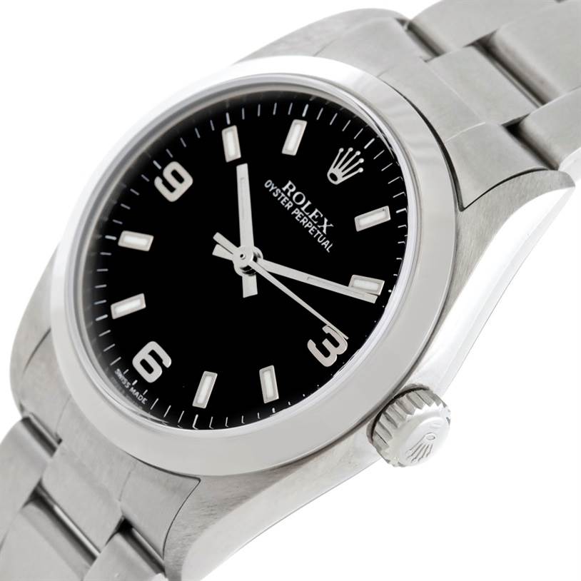 The image shows a close-up side angle of a Rolex Oyster Perpetual Mid-Size model, displaying the dial, bezel, and crown.