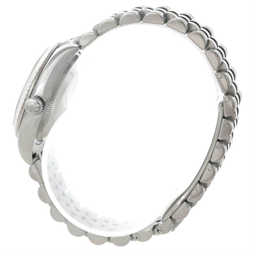 The image shows a side view of the case and bracelet of a Rolex Mid-Size 178274 Women's Stainless Steel Silver Dial 178274 Women's Stainless Steel Silver Dial watch.