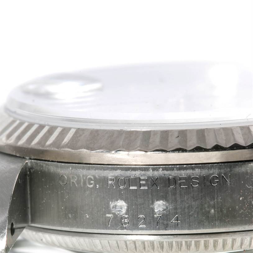 The image shows a close-up side view of the case and bezel of a Rolex Mid-Size 78274 Women's Stainless Steel Mother of Pearl Dial 78274 Women's Stainless Steel Mother of Pearl Dial model, highlighting the engraving "ORIG. ROLEX DESIGN" and the model number.