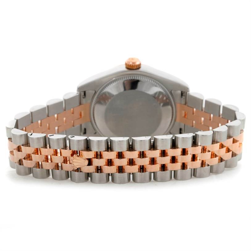 The image shows the back of a Mid-Size Rolex watch, highlighting the case and two-tone metal bracelet.