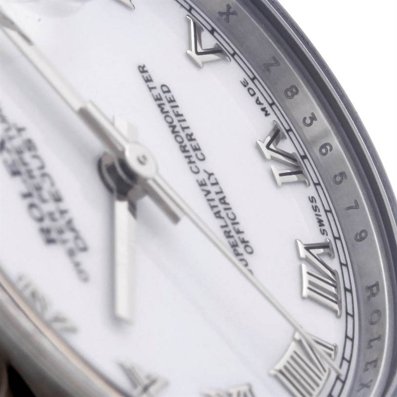 Close-up of the Rolex Mid-Size 178240 Men's Stainless Steel White Dial 178240 Men's Stainless Steel White Dial model watch face, showing the hands, Roman numerals, and part of the branding text.