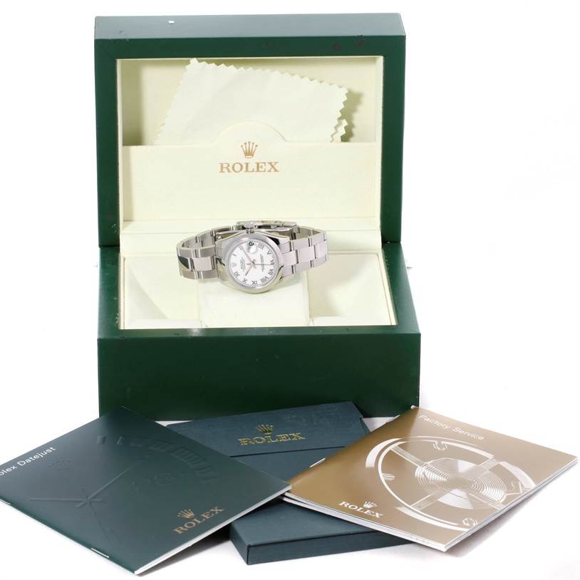 This image shows the Rolex Mid-Size 178240 Men's Stainless Steel White Dial 178240 Men's Stainless Steel White Dial model watch in its open box, along with accompanying booklets.