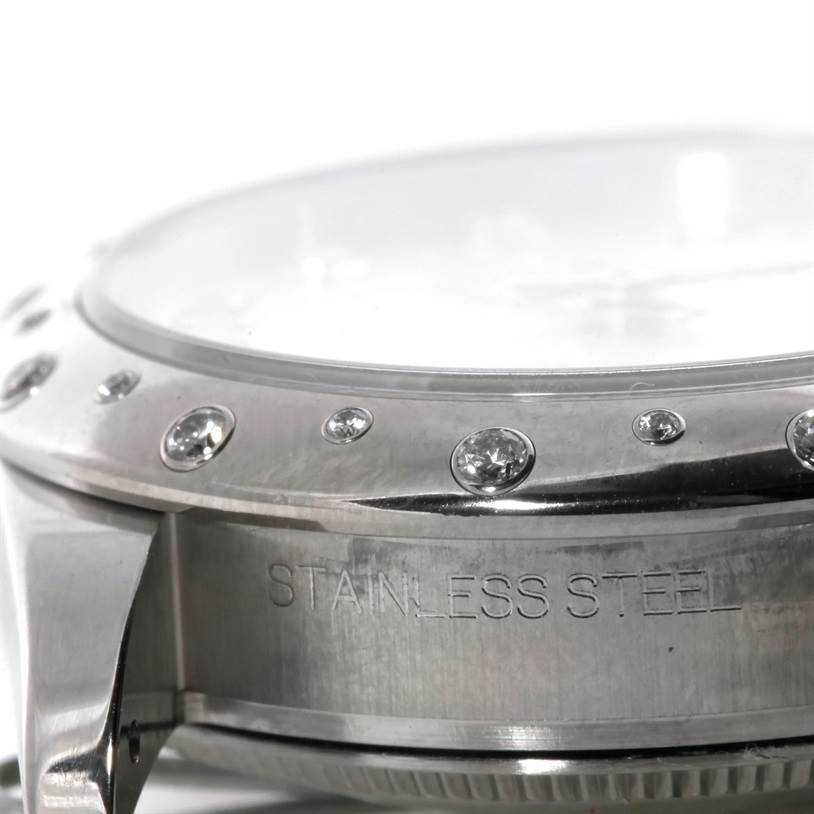 Side angle of a Rolex Mid-Size 178344 Women's Stainless Steel Silver Dial 178344 Women's Stainless Steel Silver Dial watch showing the stainless steel case and diamond-set bezel.
