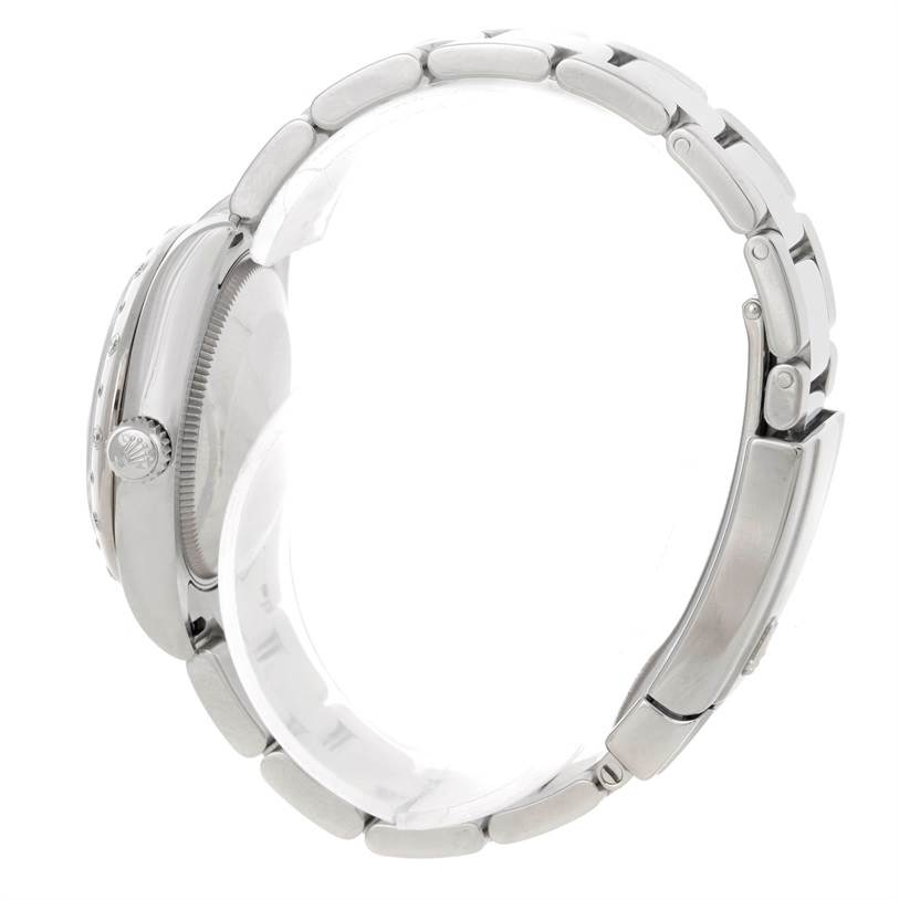 This image shows a side view of a Mid-Size Rolex watch, including parts of the bracelet and crown.