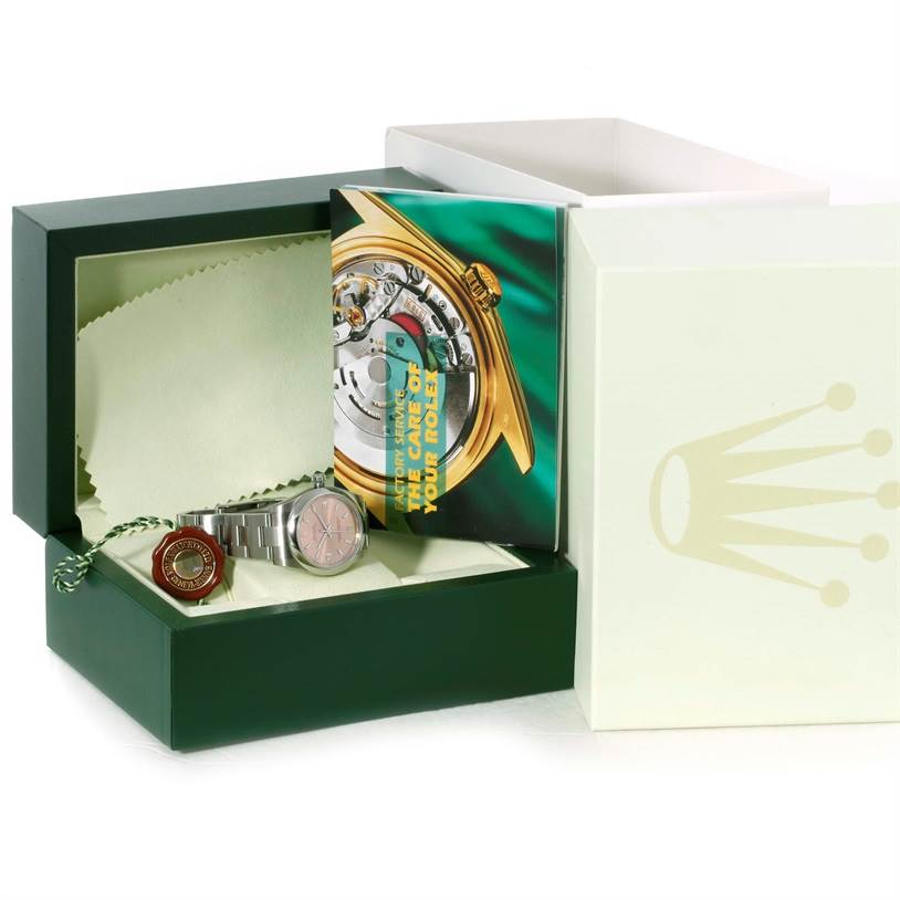 The image shows a Rolex Mid-Size 177200 Women's Stainless Steel Pink Dial 177200 Women's Stainless Steel Pink Dial watch in its box with a manual and accessories.