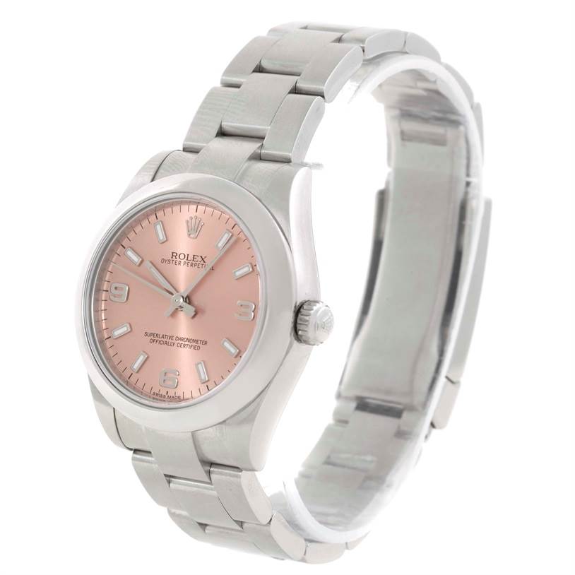 The image shows a Rolex Oyster Perpetual Mid-Size model watch angled to display the dial, case, crown, and bracelet.