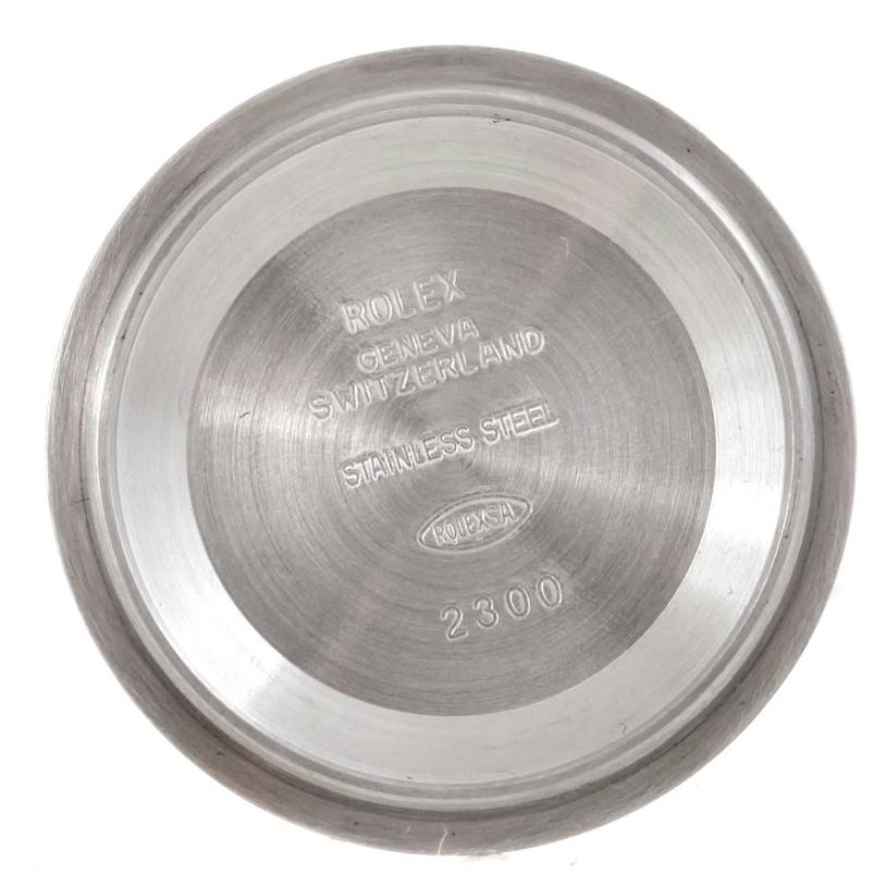 This is the inner side of the back case of a mid-size Rolex watch, displaying engraved details including "Rolex" and "Stainless Steel."