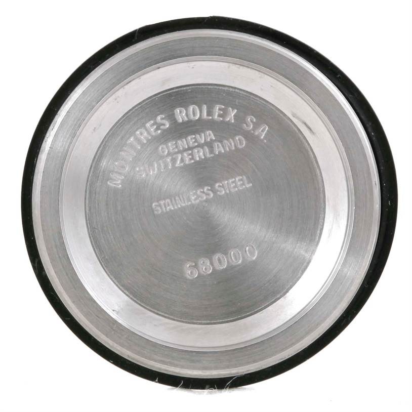 This image shows the stainless steel case back of a Rolex Mid-Size 68273 Women's Steel and Gold (two tone) Beige Dial 68273 Women's Steel and Gold (two tone) Beige Dial watch, model number 68000, viewed from the inside.