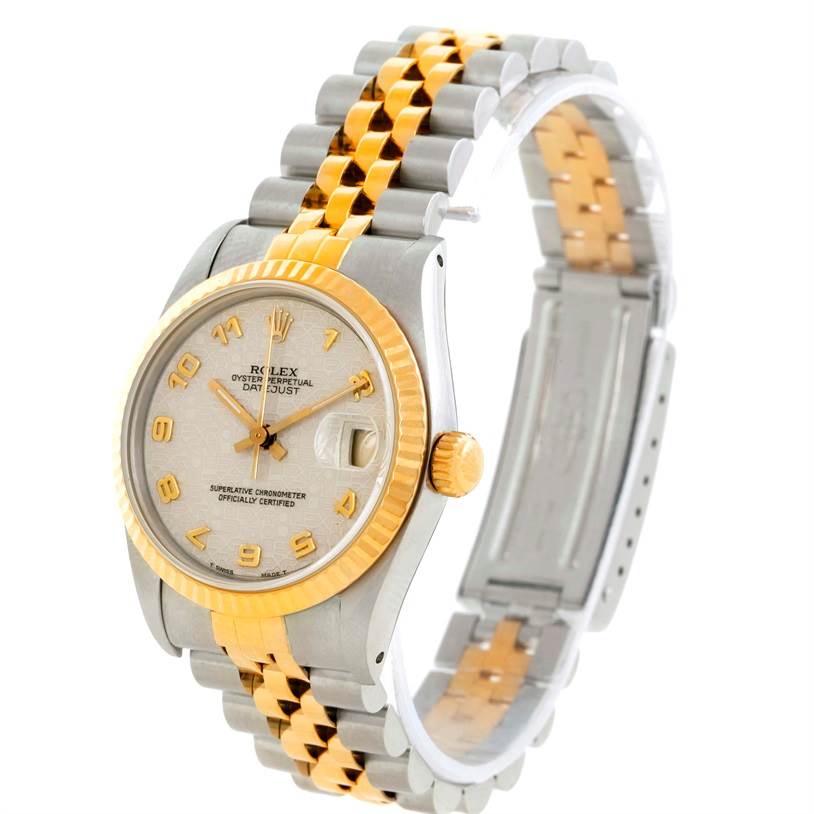 This image shows a side-angle view of a Rolex Mid-Size 68273 Women's Steel and Gold (two tone) Beige Dial 68273 Women's Steel and Gold (two tone) Beige Dial Oyster Perpetual Datejust, highlighting its dial, bezel, and two-tone bracelet.