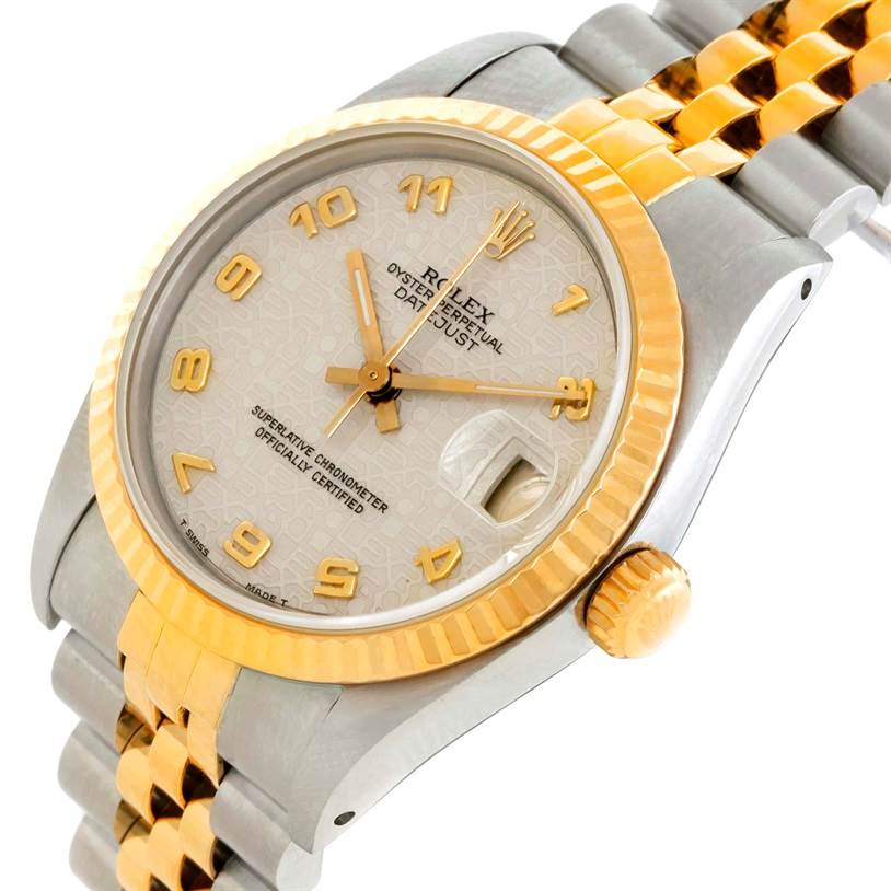 This Rolex Mid-Size 68273 Women's Steel and Gold (two tone) Beige Dial 68273 Women's Steel and Gold (two tone) Beige Dial model shows the face, bezel, crown, and a portion of the bracelet at an angle.