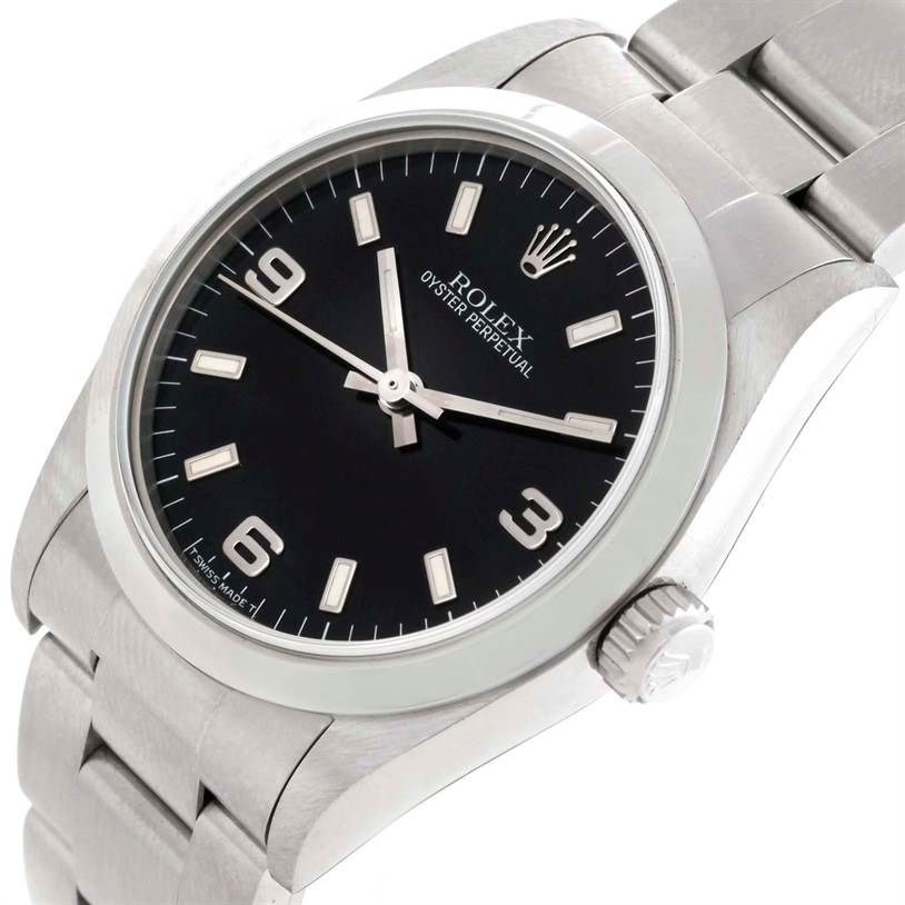 This image shows a close-up angled view of the Rolex Mid-Size 67480 Women's Stainless Steel Black Dial 67480 Women's Stainless Steel Black Dial Oyster Perpetual watch face, bezel, and part of the bracelet.