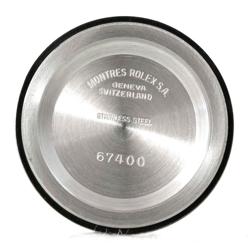 The image shows the case back for a Rolex Mid-Size 67480 Women's Stainless Steel Black Dial 67480 Women's Stainless Steel Black Dial model, emphasizing its stainless steel material and reference number, 67400.